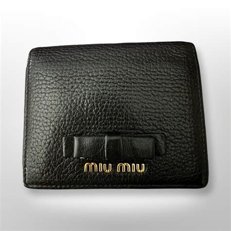 miu miu madras fiocco wallet|Miu Miu Madras Fiocco Long Flap Wallet – LuxUness.